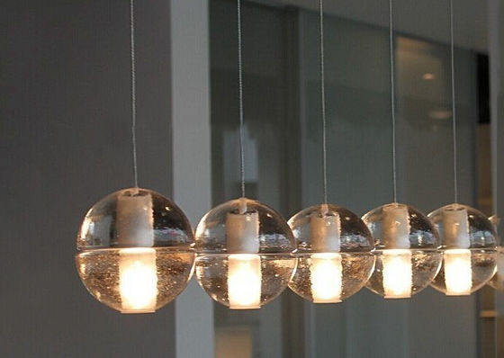 De transparante Kristalkroonluchter steekt Verlichting van de Glas de Bal Geleide Tegenhanger aan
